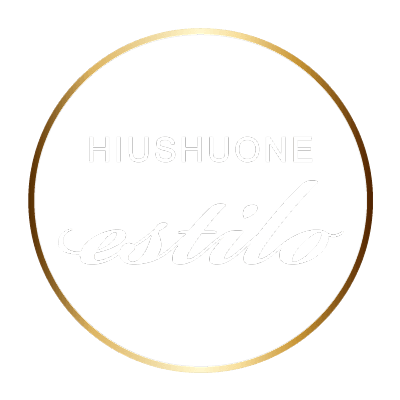 Hiushuone Estilon logo kultaisella ympyrällä ja valkoisella tekstillä.