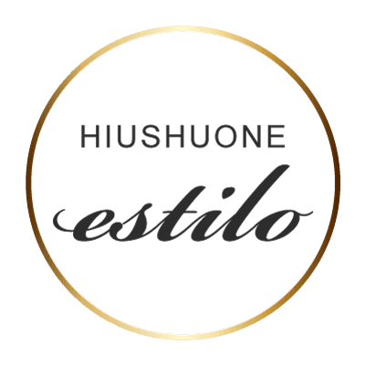 Hiushuone Estilon logo, jossa on kultainen rengas ja musta teksti.
